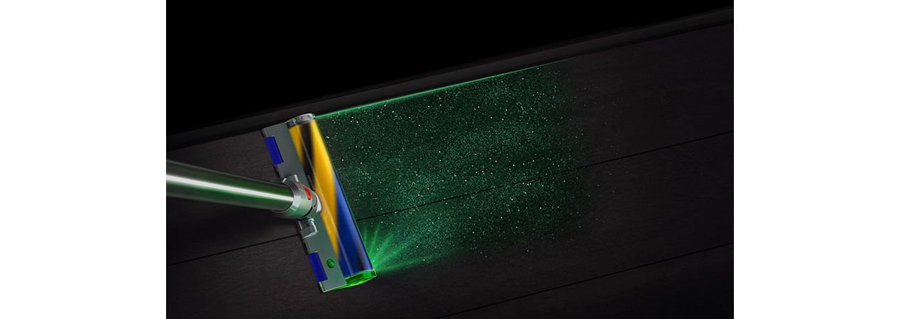 Cabezal de aspiradora Dyson Laser Slim Fluffy™ que deja al descubierto el polvo